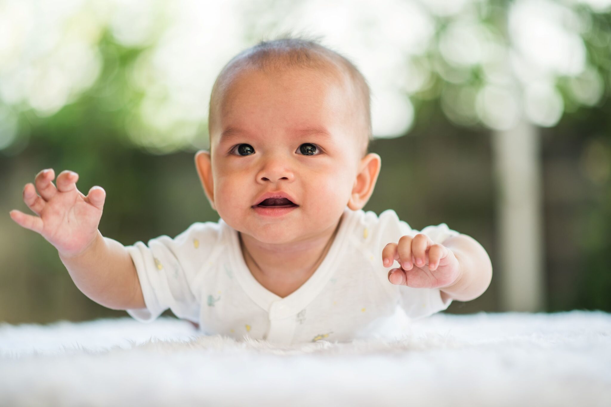 newborn-child-relaxing-on-a-rug-2025-01-16-15-19-38-utc
